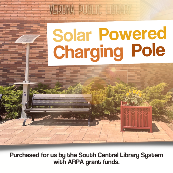 solar charging pole and bench in front of library